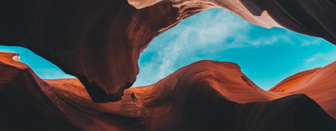 Skyward shot from inside a canyon